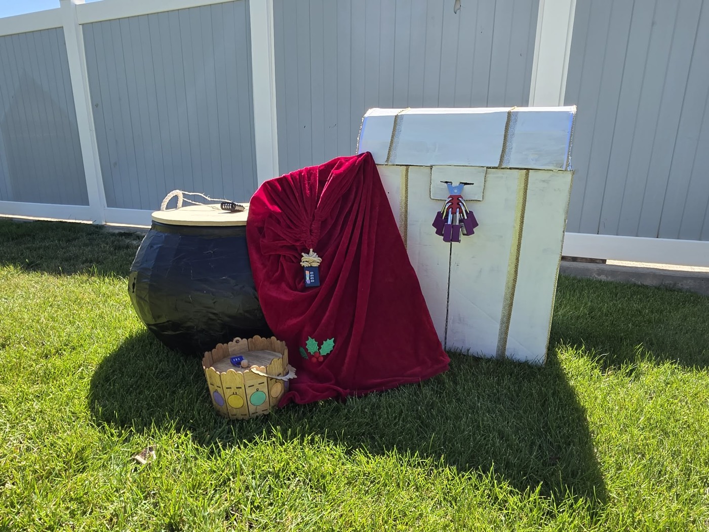 Handmade escape room props set up on a lawn in Rock Springs, Wyoming